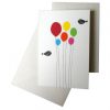 carte aux ballons en papiers multicolores