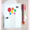 carte aux ballons en papiers multicolores